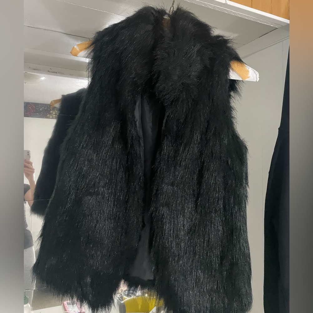 Black faux fur vest